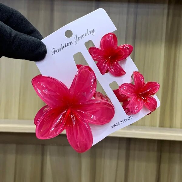 Pinces à cheveux fleurs roses