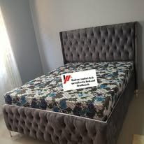custom made bed with a high base