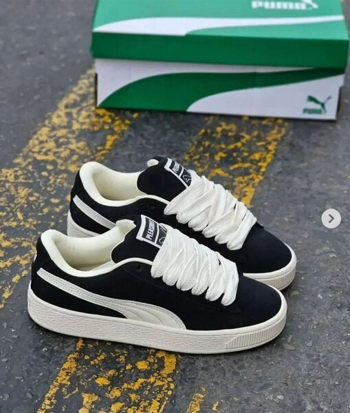 Puma baskets basses noir et blanc