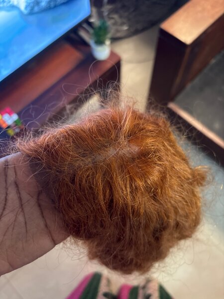 Perruque rousse bouclée