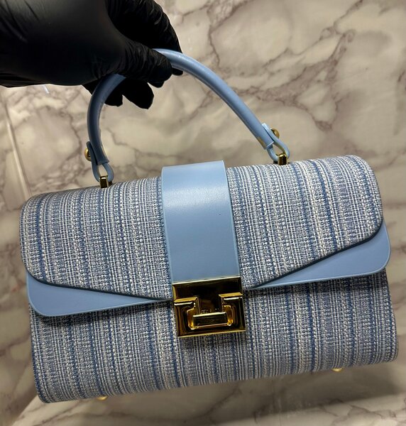 Sac à main élégant tissé