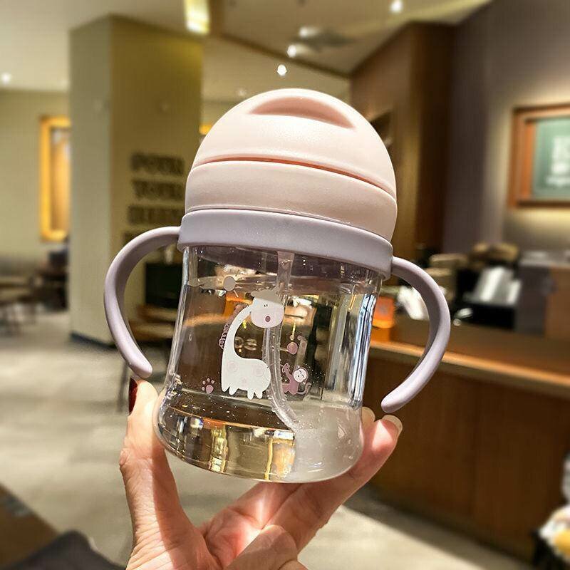 Nursing bottle with straw