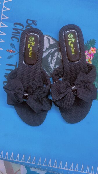 Mules noires avec nœud élégant