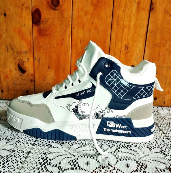 Chaussures de sport blanches et bleues pour hommes