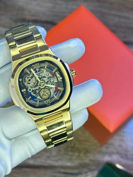 Montre squelette dorée homme