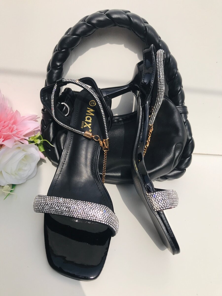 Luxury silver and black heel