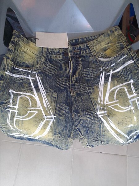 Shorts en jean délavé homme