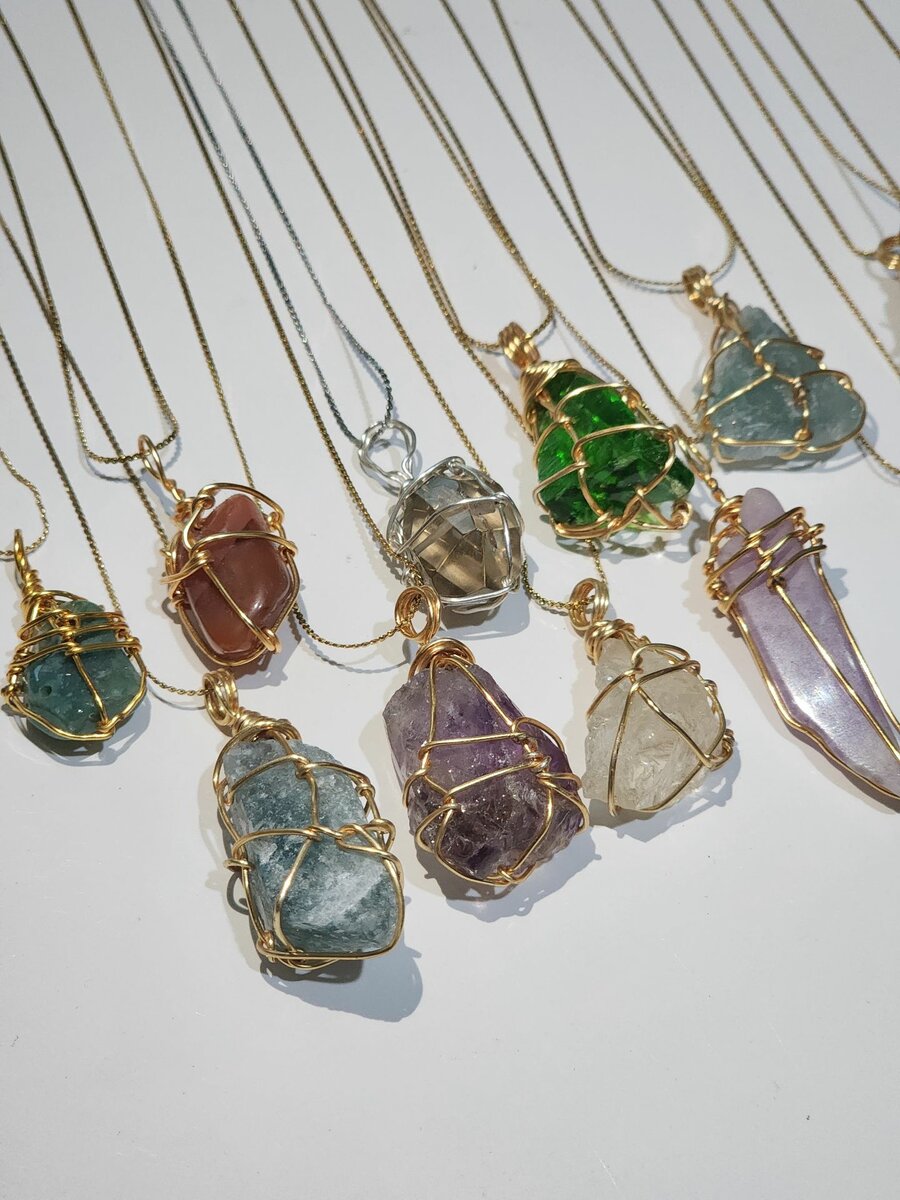 CRYSTAL STONE NECKLACES.
