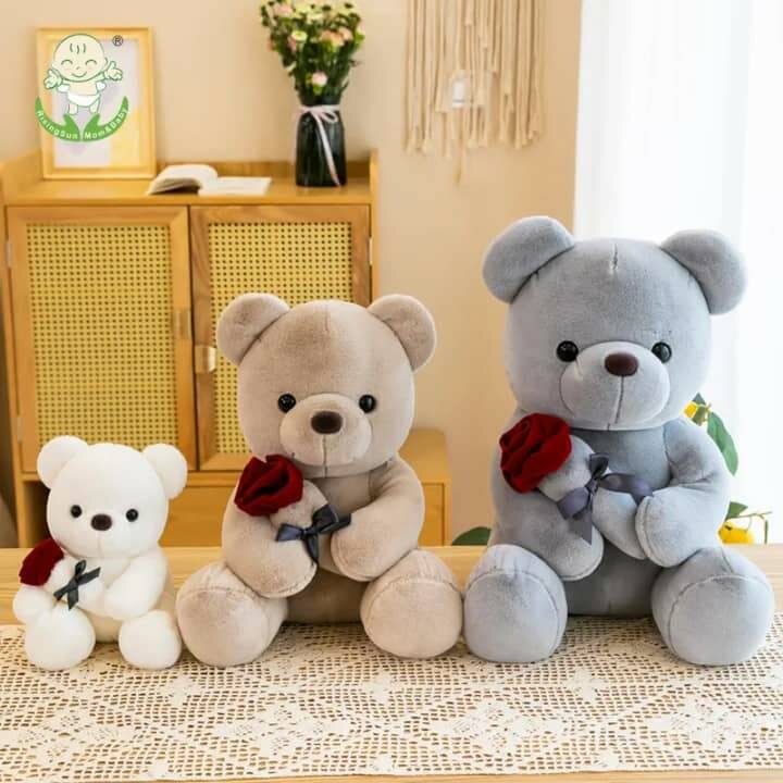 Ours en peluche avec rose