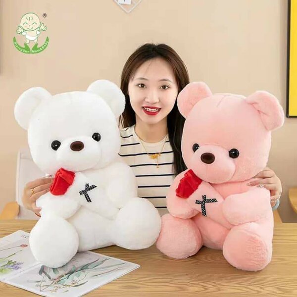 Ours en peluche avec rose