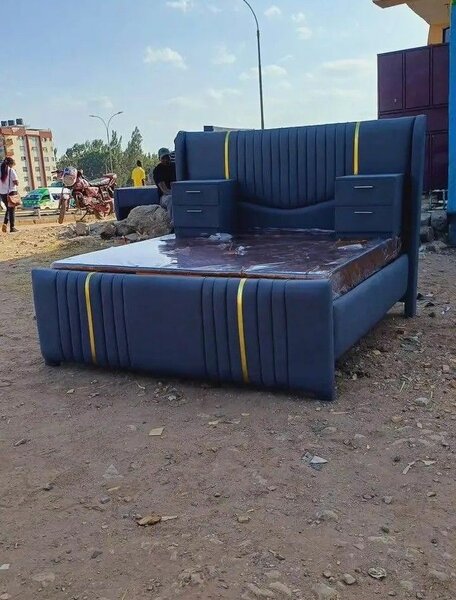 Lit double capitonné en tissu