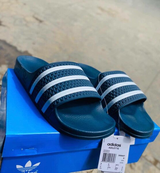 Adidas slides and Nike slides