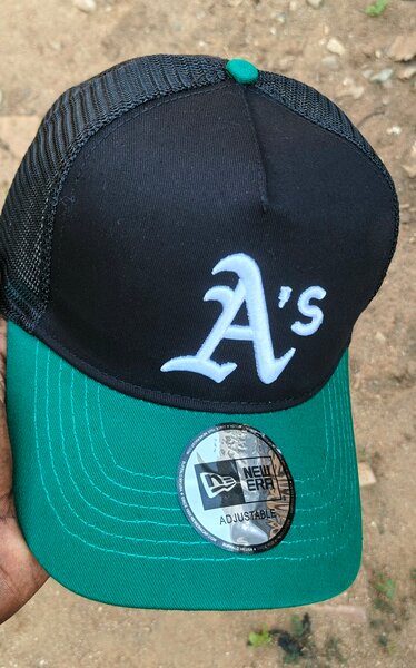 Casquette Trucker New Era A's noir et vert