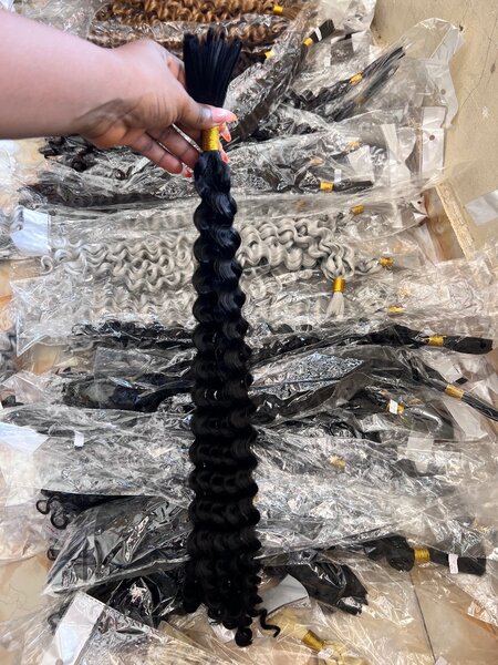 Extensions cheveux bouclés