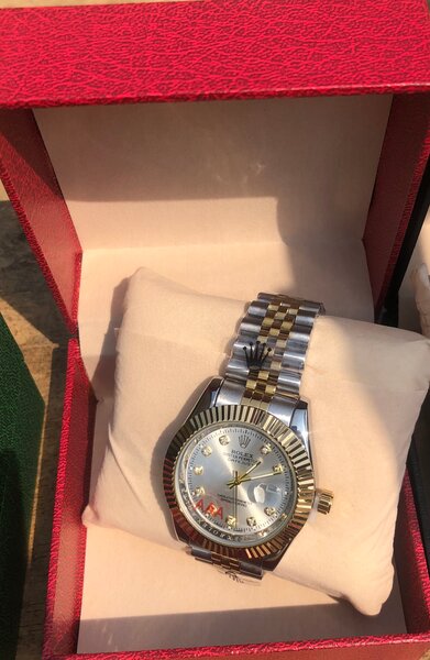 Montre élégante bicolore