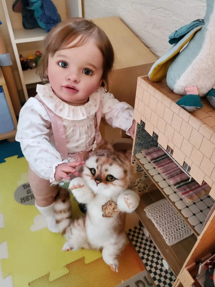 Poupée réaliste en vinyle 75cm