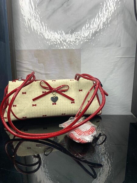 Sac à main élégant avec motif nœud