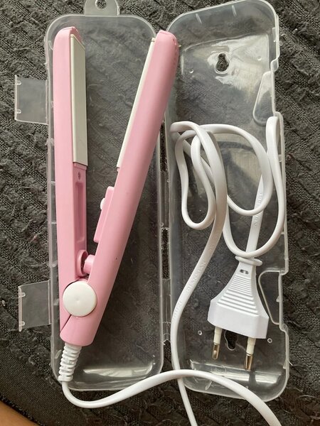 Lisseur de cheveux électrique rose