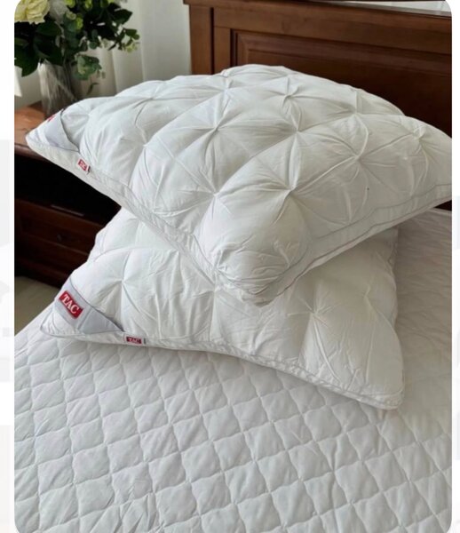 Oreiller en plumes confortable