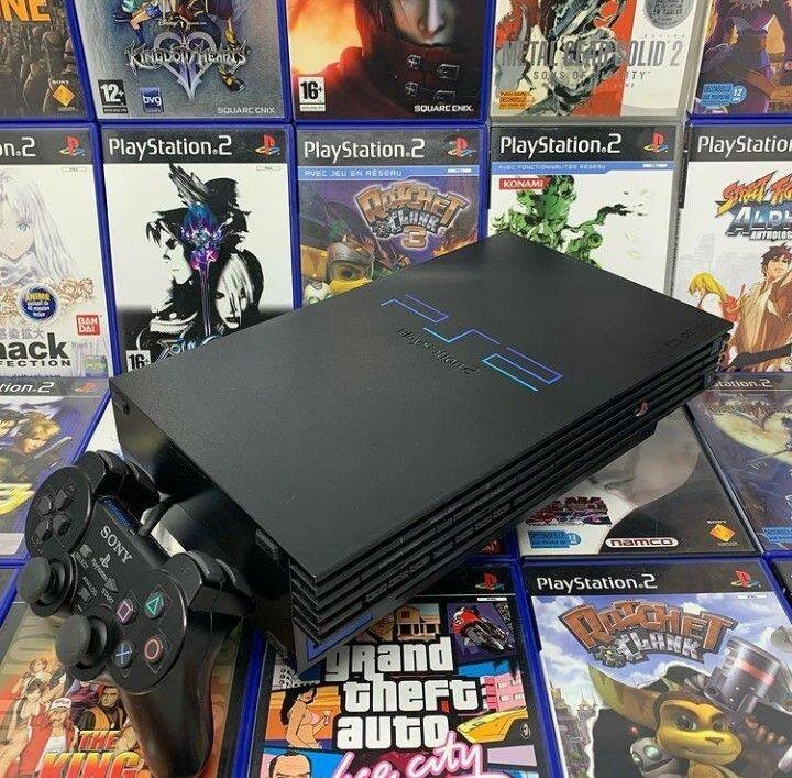 Sony PlayStation 2 Slim avec 2 manettes