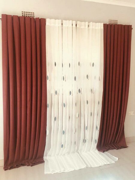 2 drops of curtains blue greyish white and red