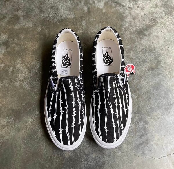 Vans Slip-On Noirs à Motif