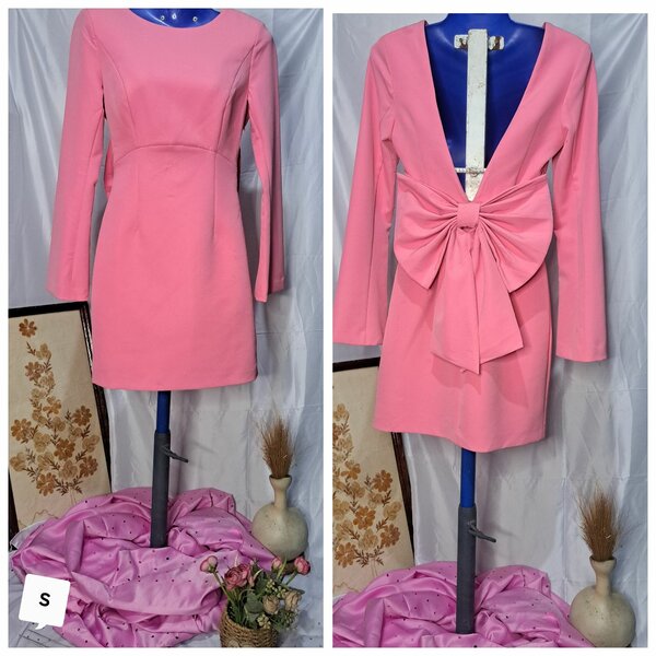 Robe rose élégante avec nœud