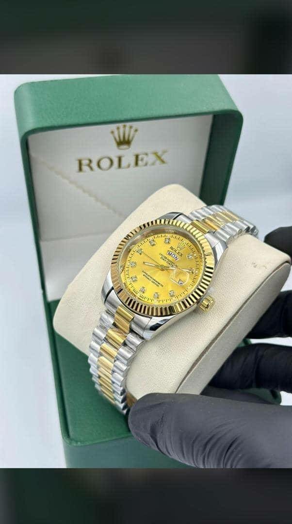 Montre de luxe en or et acier