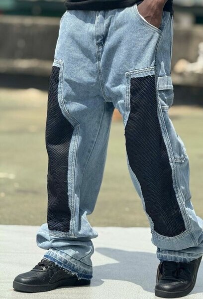 Jean déchiré homme bleu avec patch noir