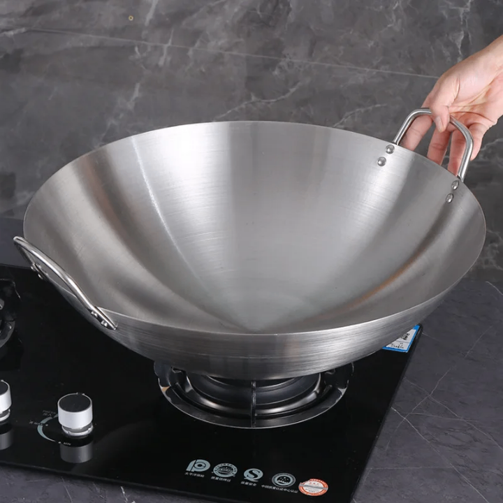 Wok en acier inoxydable