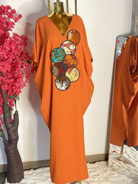 Robe longue orange avec broderie