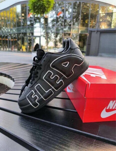 Baskets noires FLEA Nike