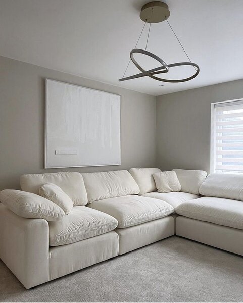 Canapé d'angle en tissu blanc