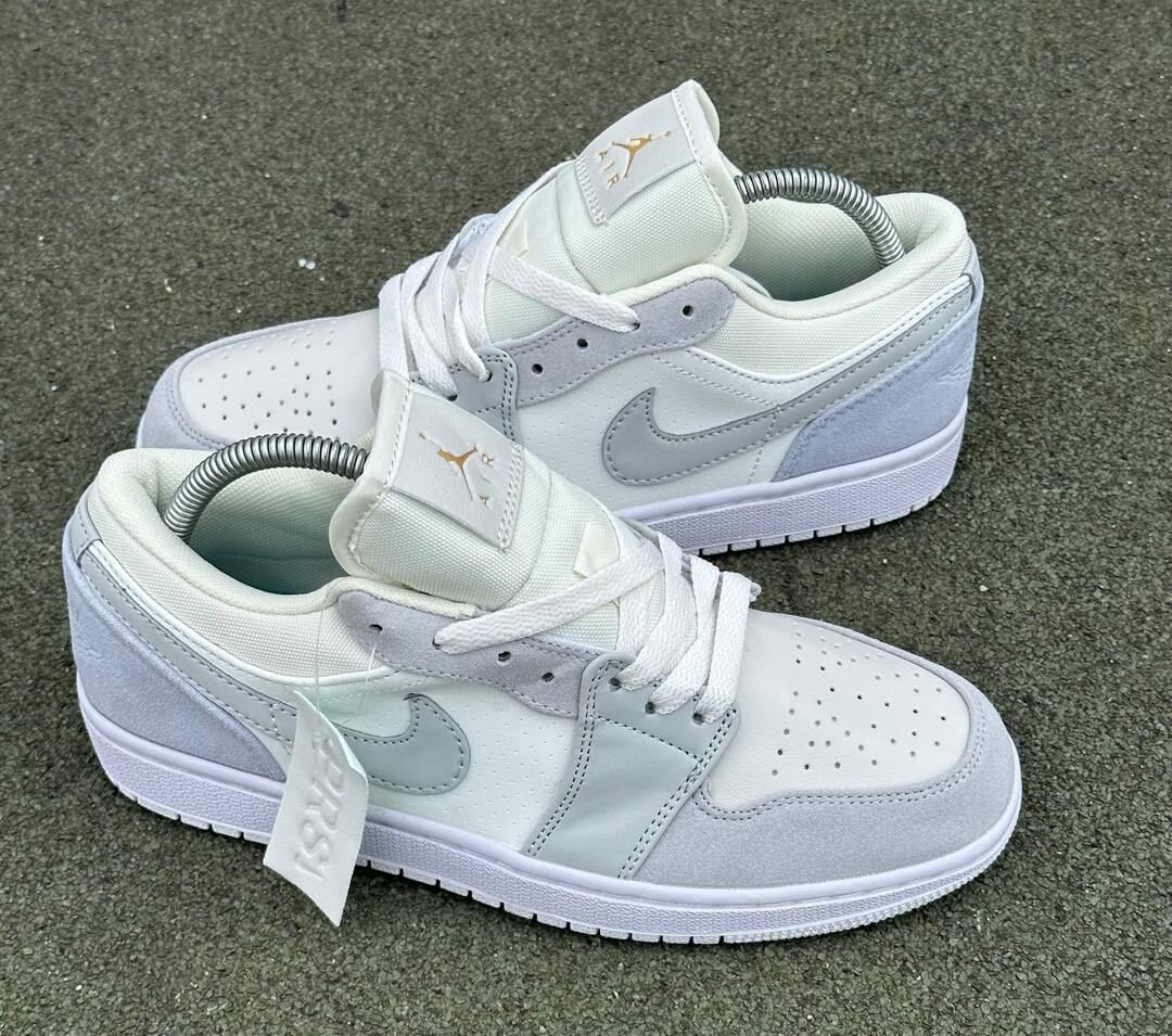 Baskets basses en cuir gris et blanc