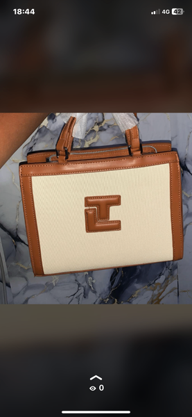 Sac élégant en cuir et tissu