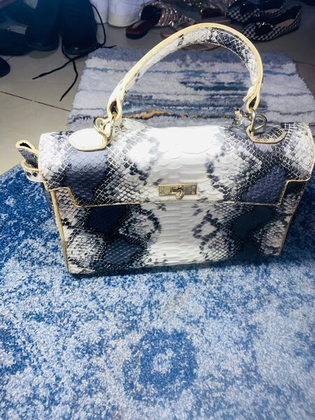 Sneakers, bag and smart ladies shoes