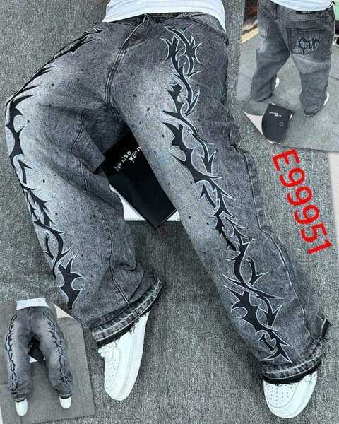 Jeans homme gris avec motifs déchirés