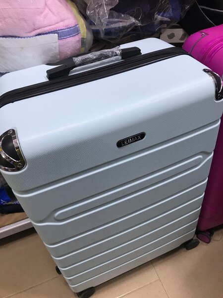 Valise à roulettes colorée