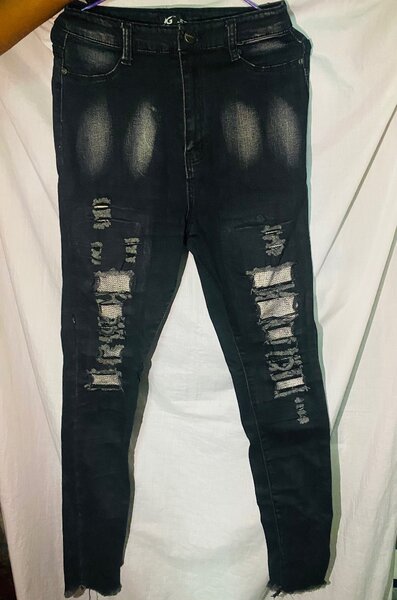 Jeans déchirés noirs tendance