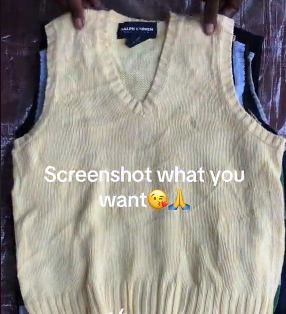 The vest is light beige in color