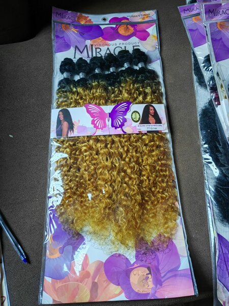 Extensions bouclées ombré