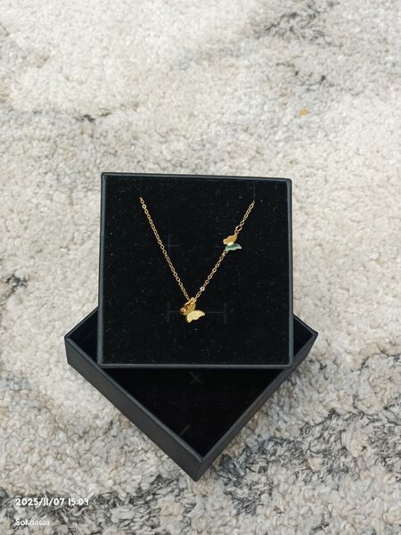 Collier pendentif étoiles dorées