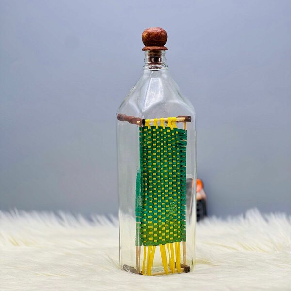 Charpai in Glass Bottle Decor.