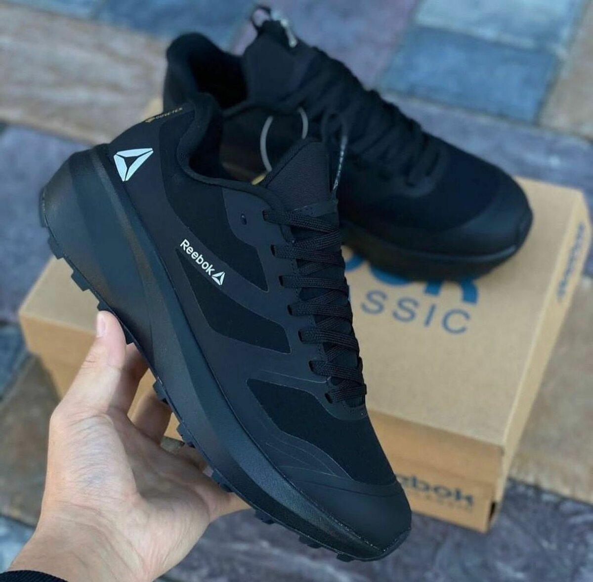 Chaussures Reebok Noir à Crans