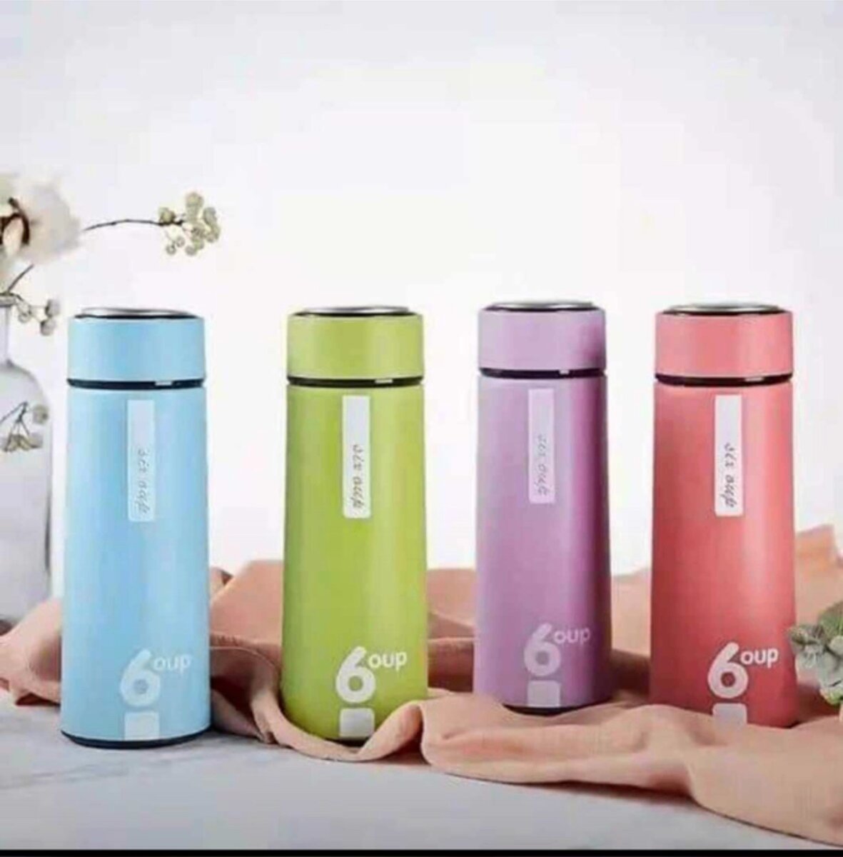 Glass bottles and tumblers
