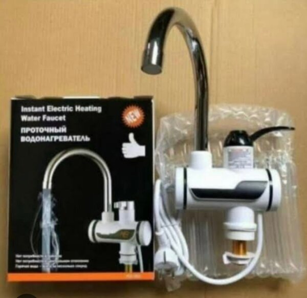 Instant electric hot water tap geyser