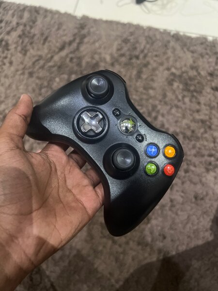 Xbox 360 Slim ( With games, and extra Accessories )