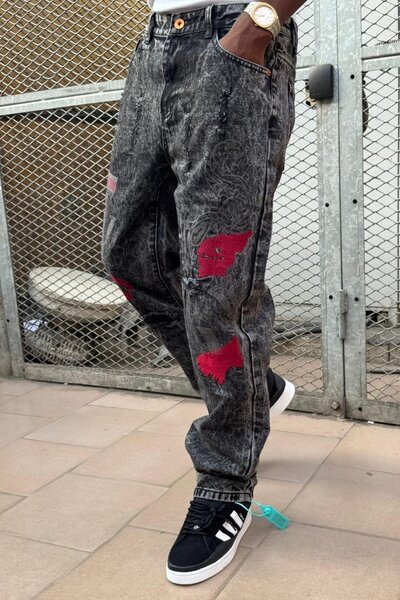 Jeans déchirés tendance homme