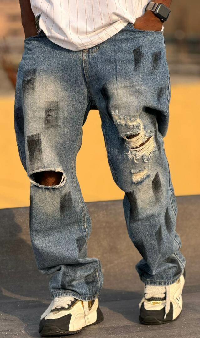 Jeans déchirés homme