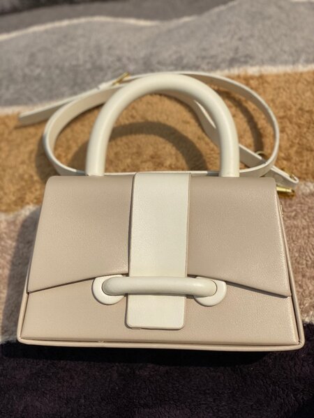 Designer handheld bag